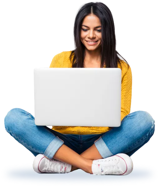 Woman sitting cross-legged with laptop, using Cover Letter Builder.