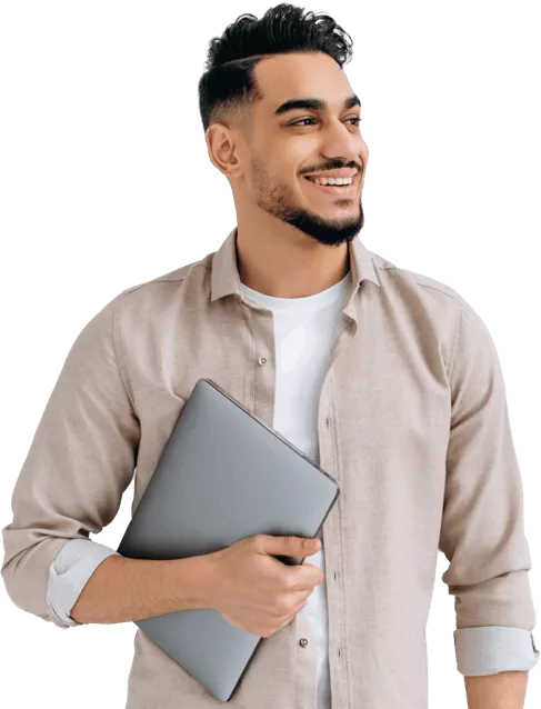 Man with laptop using resume builder