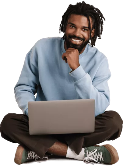 Guy with laptop using resume builder